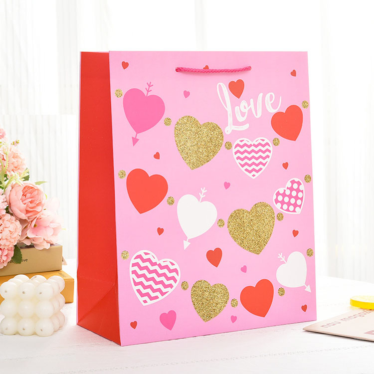 Luxury Brand Logo Gift Paper Bag for Clothes Pink Matte Garment Clothing Boutique Packaging Bags product reference